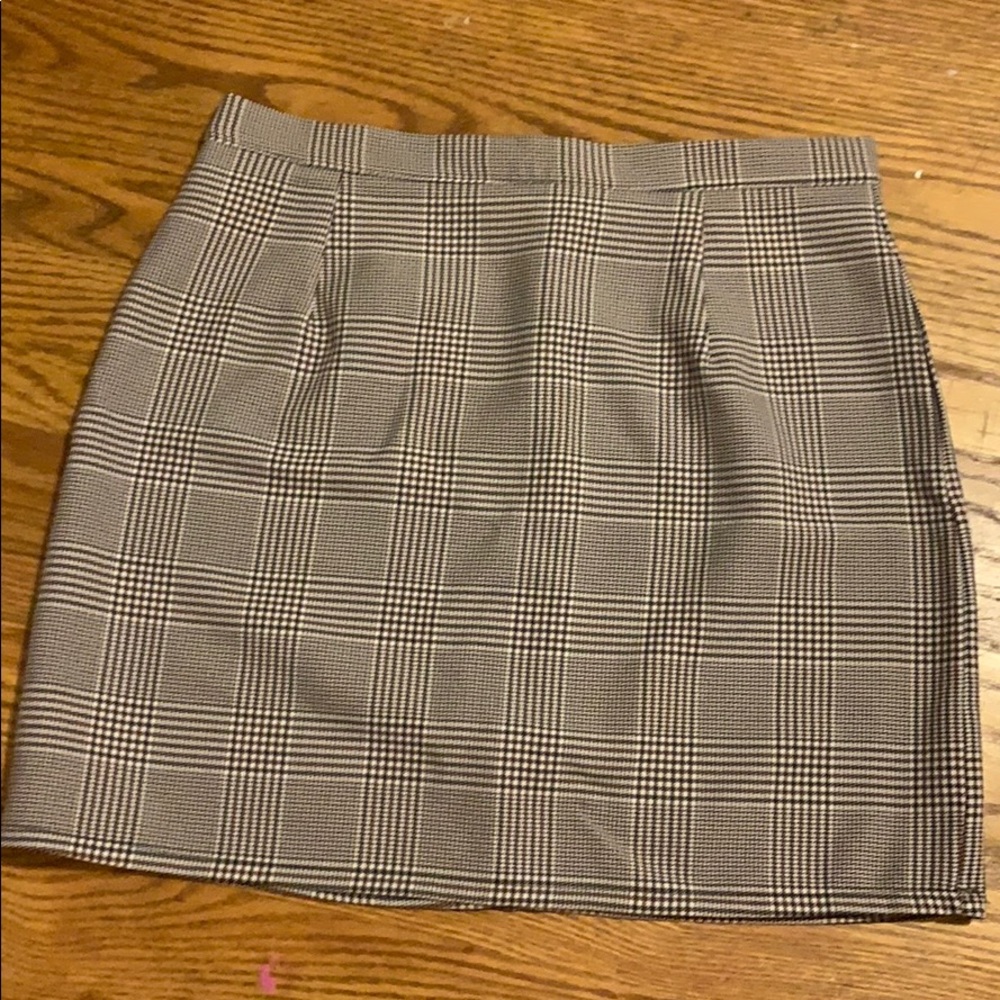 Tight fitting plaid skirt